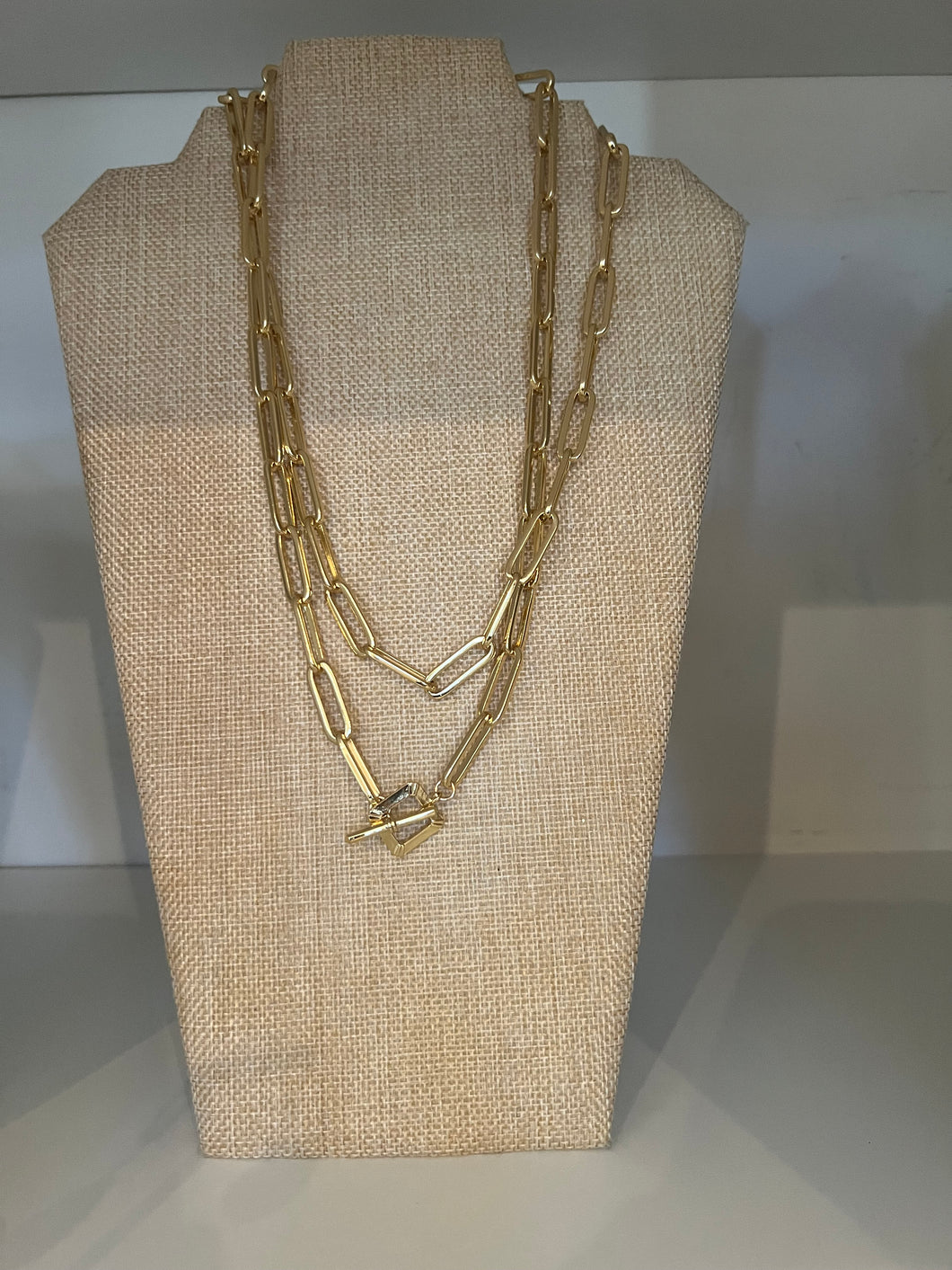 Gold paperclip long chain with square toggle