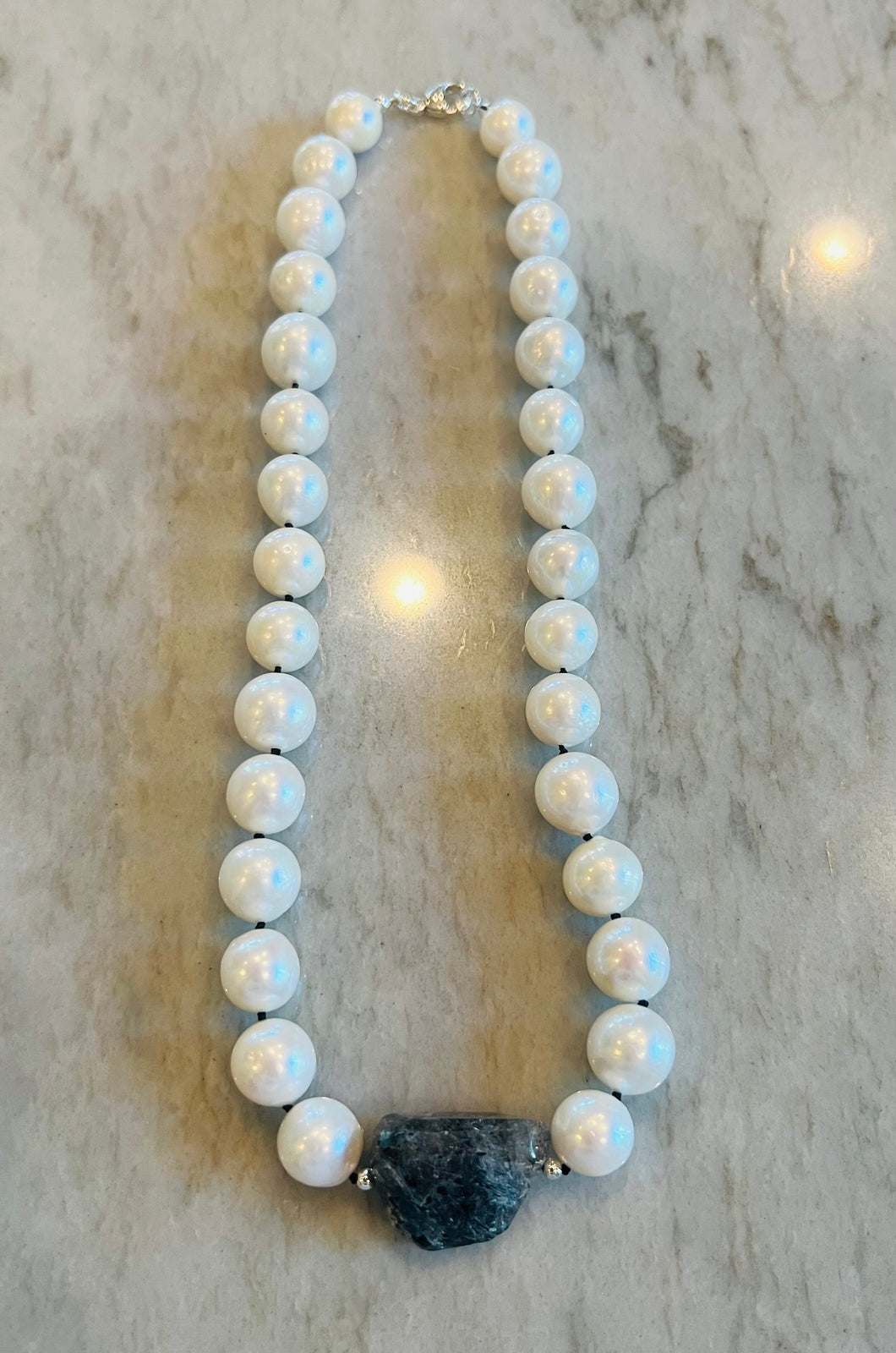 Navy knotted pearls
