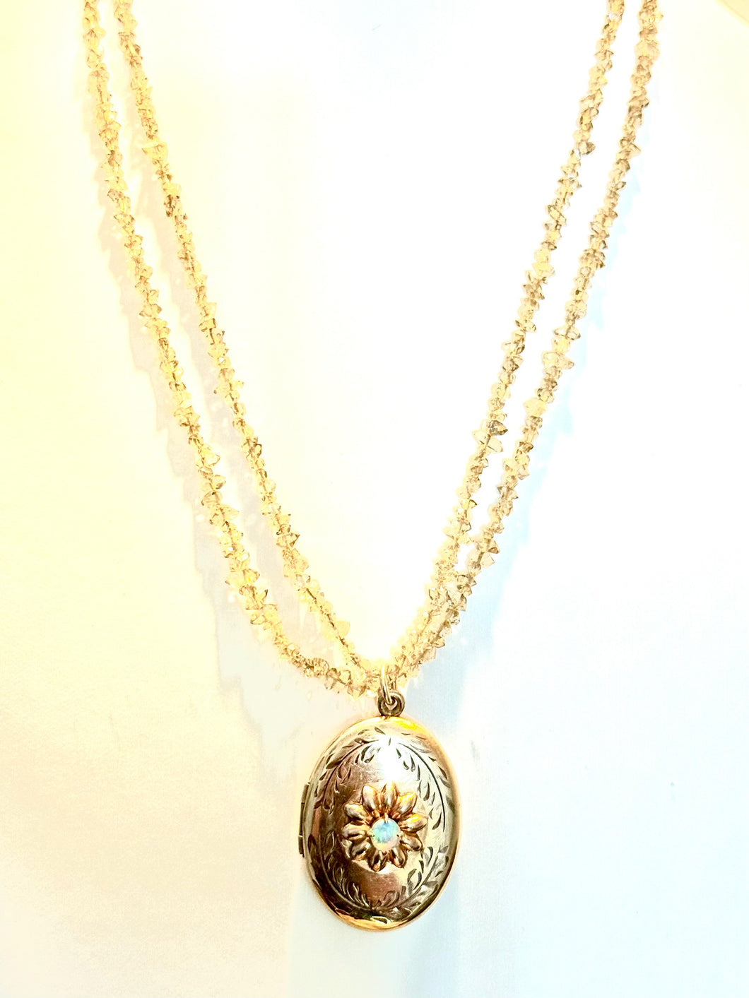 Antique gold locket with opal